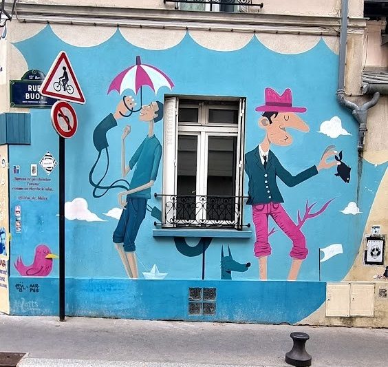 Street-art mural on a Parisian façade